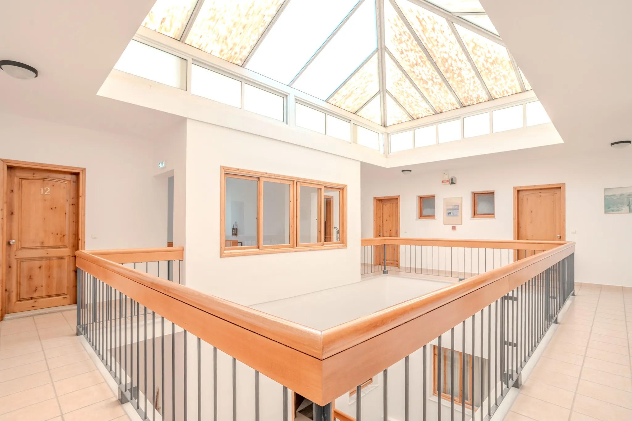 The glass-roofed atrium